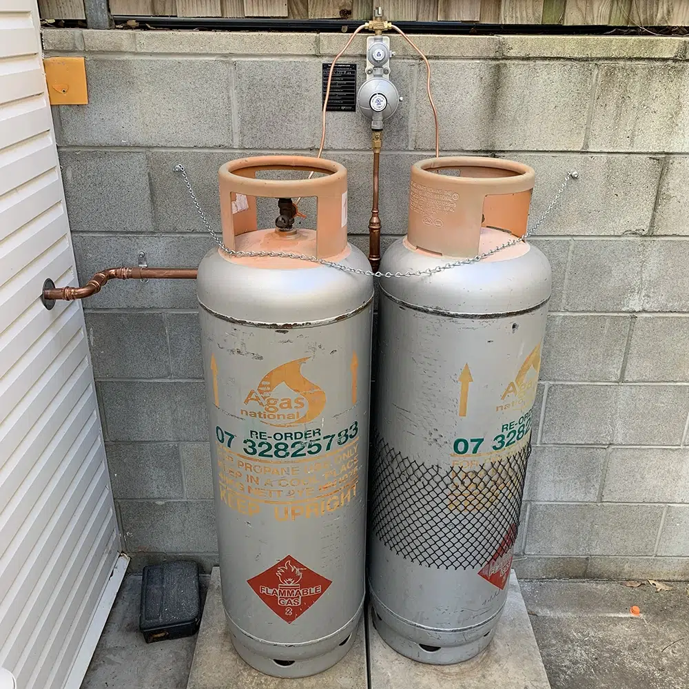 Gas Pipelines installed from a building to external LPG Bottles by High Tide Plumbing & Gas. Gas Fitting On The Gold Coast