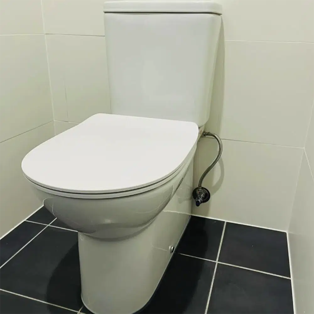 New Toilet installation in a powder room - High Tide Plumbing & Gas