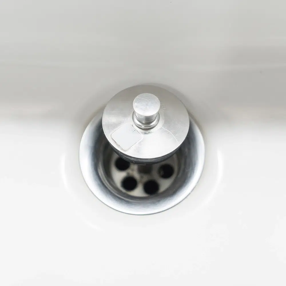 A white hand basin was cleared by blocked drains in a Gold Coast home.