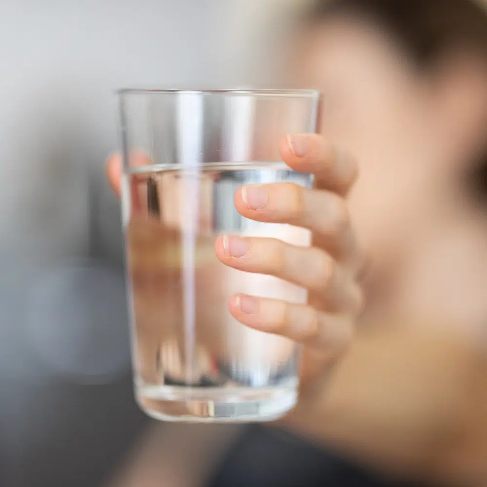 A Clear glass of water from a home water filtration system by High Tide Plumbing & Gas
