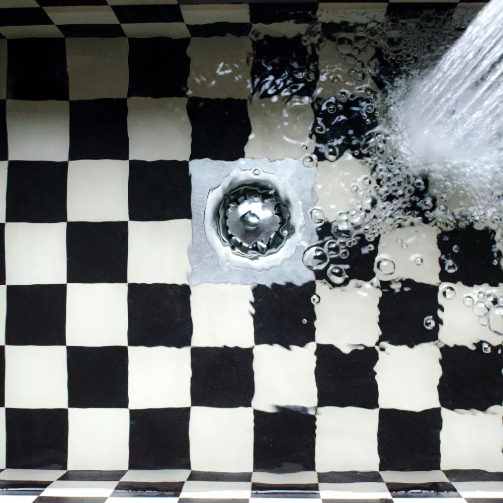 A Local Blocked Drain Specialist unblocks a Gold Coast Bathroom