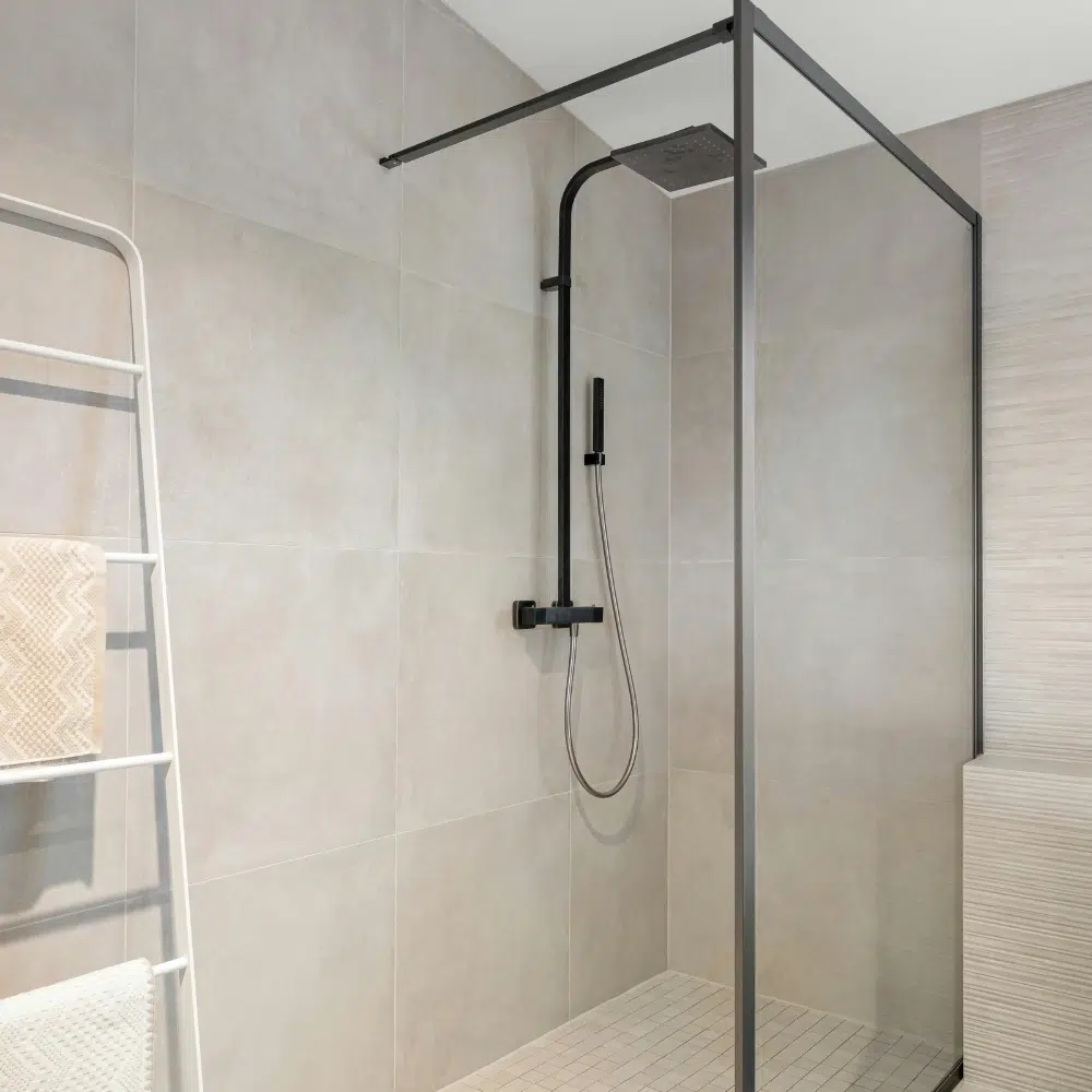 A sleek modern leakproof shower is installed by High Tide Plumbing & Gas to a Gold Coast bathroom renovation