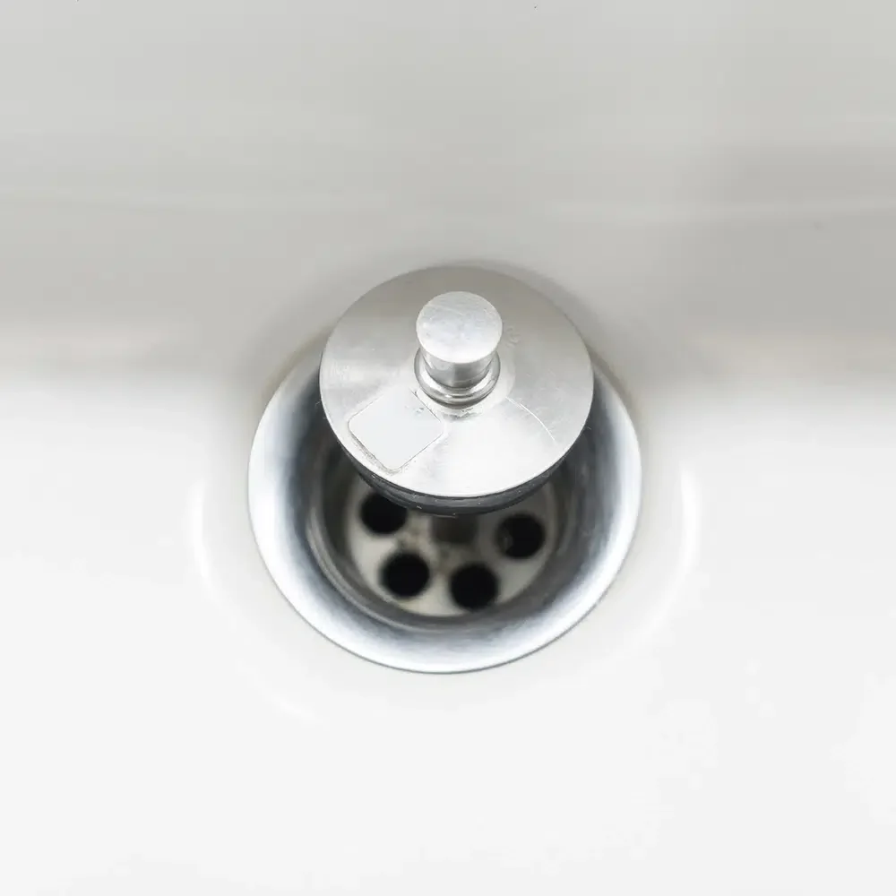 A white hand basin was cleared by blocked drains in a Gold Coast home.