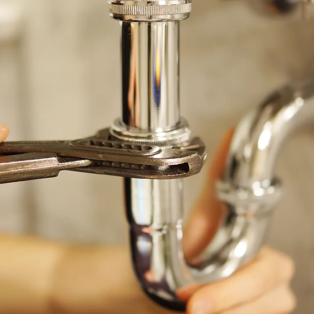 Under sink Burst Pipes on the gold Coast being repaired by a professional plumber - High Tide Plumbing & Gas