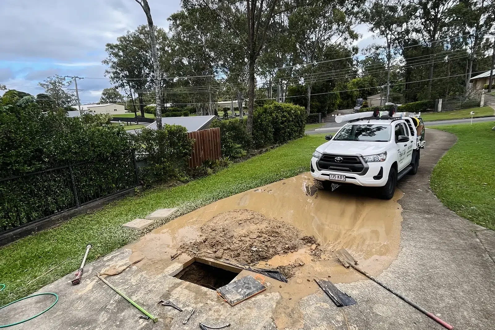 Burst Pipe Repairs on the Gold Coast at a hinterland property where the driveway is dug up by High Tide Plumbing & Gas
